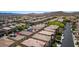 An aerial view showcasing the layout of the homes with neutral colored roof tiles in the neighborhood at 10519 Mann St, Las Vegas, NV 89141