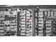 A black and white aerial view of the neighborhood with the current property outlined in red at 10519 Mann St, Las Vegas, NV 89141