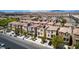 An aerial view of the residential area showcasing various two-story homes with solar panels at 10519 Mann St, Las Vegas, NV 89141