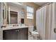 The bathroom features a vanity and standard shower/tub combo at 10519 Mann St, Las Vegas, NV 89141