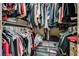 Walk-in closet features ample hanging space with shelving and storage bins at 10519 Mann St, Las Vegas, NV 89141