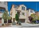 Inviting two-story home with desert landscaping and private balcony off the main suite at 10519 Mann St, Las Vegas, NV 89141