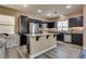 Kitchen with stainless steel appliances and a breakfast bar at 10519 Mann St, Las Vegas, NV 89141
