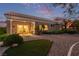 Backyard with covered patio, desert landscaping, and outdoor seating at 10832 Heritage Hills Dr, Las Vegas, NV 89134