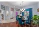 Stylish dining area featuring tile and wood floors, with an adjacent living space at 10832 Heritage Hills Dr, Las Vegas, NV 89134