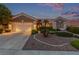 Inviting home showcasing a wide driveway and well-kept landscaping enhancing its curb appeal at 10832 Heritage Hills Dr, Las Vegas, NV 89134