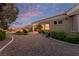 Beautiful property featuring desert landscaping, a covered patio, and a well-maintained exterior at 10832 Heritage Hills Dr, Las Vegas, NV 89134