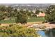 Scenic view of people practicing on the golf course with water feature and foliage in the foreground at 10832 Heritage Hills Dr, Las Vegas, NV 89134