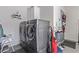 Functional laundry room equipped with modern washer and dryer units at 10832 Heritage Hills Dr, Las Vegas, NV 89134