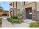 Inviting front entrance features stone accents, manicured landscaping, and a pathway leading to the front door at 11280 Granite Ridge Dr # 1012, Las Vegas, NV 89135