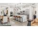 Modern kitchen with white cabinetry, stainless steel appliances, a large island, and an open layout at 11280 Granite Ridge Dr # 1012, Las Vegas, NV 89135