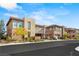 Charming street view showcasing well-maintained townhomes with manicured landscaping and modern architectural design at 11280 Granite Ridge Dr # 1012, Las Vegas, NV 89135