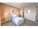 Stylish bedroom showcasing a heart-themed accent wall, creating a unique personal space at 1213 Dre Harbor Pl # Lot 83, North Las Vegas, NV 89084