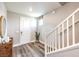 Welcoming foyer featuring wood floors, staircase, and stylish decor for a modern look at 1213 Dre Harbor Pl # Lot 83, North Las Vegas, NV 89084