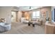 Cozy living area with comfortable seating, a stylish coffee table, and lots of natural light at 1213 Dre Harbor Pl # Lot 83, North Las Vegas, NV 89084