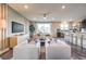 Spacious living room with modern design elements, large windows, and open floor plan at 1213 Dre Harbor Pl # Lot 83, North Las Vegas, NV 89084