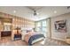 Serene main bedroom with decorative wall, a large window, and ensuite bathroom at 1213 Dre Harbor Pl # Lot 83, North Las Vegas, NV 89084