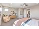 Bright and airy main bedroom with a dresser, chair, and serene decor at 1213 Dre Harbor Pl # Lot 83, North Las Vegas, NV 89084