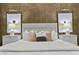 Luxurious primary bedroom featuring a plush bed, stylish nightstands, soft lighting, and elegant decor at 1228 Stellar Rim Ct, Henderson, NV 89012