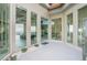 Open-air courtyard with floor-to-ceiling windows and modern finishes with natural lighting at 1228 Stellar Rim Ct, Henderson, NV 89012