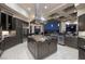 Gourmet kitchen with stainless steel appliances, center island, and granite countertops and a view at 1228 Stellar Rim Ct, Henderson, NV 89012