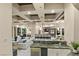 Open concept living space showcases seamless transitions from the living, dining, kitchen, and bar areas at 1228 Stellar Rim Ct, Henderson, NV 89012