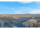 An aerial view displays the property's setting within the city and surrounding landscape at 135 Harmon Ave # 3220, Las Vegas, NV 89109