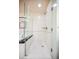 Bright bathroom with a glass enclosed shower, with tile surround at 135 Harmon Ave # 3220, Las Vegas, NV 89109