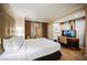 Comfortable bedroom featuring a plush bed and a built-in entertainment center at 135 Harmon Ave # 3220, Las Vegas, NV 89109