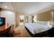 Well-appointed bedroom with connecting bath featuring modern fixtures and design at 135 Harmon Ave # 3220, Las Vegas, NV 89109