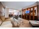 Bright living area with dining space, kitchenette, comfortable seating, and a large flat-screen TV at 135 Harmon Ave # 3220, Las Vegas, NV 89109