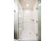 Bright tile shower with glass enclosure and modern fixtures at 135 Harmon Ave # 3220, Las Vegas, NV 89109