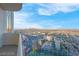 Condo balcony overlooking a golf range and the city at 135 Harmon Ave # 3220, Las Vegas, NV 89109