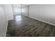 Cozy bedroom with hardwood floors and large mirrored closet at 1405 Vegas Valley Dr # 380, Las Vegas, NV 89169