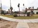 Community pool, surrounded by lush greenery and well-maintained walkways at 1405 Vegas Valley Dr # 380, Las Vegas, NV 89169