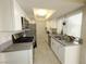 Well-lit kitchen boasts stainless steel appliances and ample counter space at 1405 Vegas Valley Dr # 380, Las Vegas, NV 89169