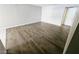 Bright and airy living room featuring wood-like floors and a neutral color palette at 1405 Vegas Valley Dr # 380, Las Vegas, NV 89169