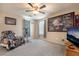 Comfortable carpeted bedroom featuring neutral paint and ceiling fan at 162 Sand Lake St, Henderson, NV 89074