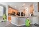 Charming kitchen featuring granite countertops, stainless steel appliances and light wood cabinetry at 162 Sand Lake St, Henderson, NV 89074