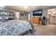 The spacious main bedroom features a dresser with a wall-mounted TV, and a walk-in closet at 162 Sand Lake St, Henderson, NV 89074