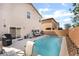 Backyard view of the pool with patio area, dining, and exterior access at 162 Sand Lake St, Henderson, NV 89074