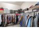 Organized walk-in closet with shelving, hanging racks, and ample storage space at 162 Sand Lake St, Henderson, NV 89074
