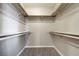 Walk-in closet with carpet and shelving for ample storage in bedroom at 1620 Yellow Rose St, Las Vegas, NV 89108