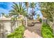 Backyard featuring a manicured landscape and brick pavers at 170 Wicked Wedge Way, Las Vegas, NV 89148