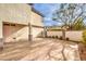 Spacious backyard featuring a stamped concrete patio and privacy wall at 170 Wicked Wedge Way, Las Vegas, NV 89148