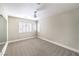 Bright bedroom features large windows and a ceiling fan at 170 Wicked Wedge Way, Las Vegas, NV 89148