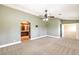 Spacious main bedroom with a ceiling fan and ensuite bathroom entrance at 170 Wicked Wedge Way, Las Vegas, NV 89148