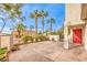 Cozy backyard patio with mature trees and plants, perfect for entertaining at 170 Wicked Wedge Way, Las Vegas, NV 89148