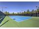 Well-maintained outdoor tennis court for recreational enjoyment at 170 Wicked Wedge Way, Las Vegas, NV 89148
