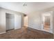 Spacious carpeted bedroom with closet and backyard access through glass paneled door at 1729 Yellow Rose St, Las Vegas, NV 89108